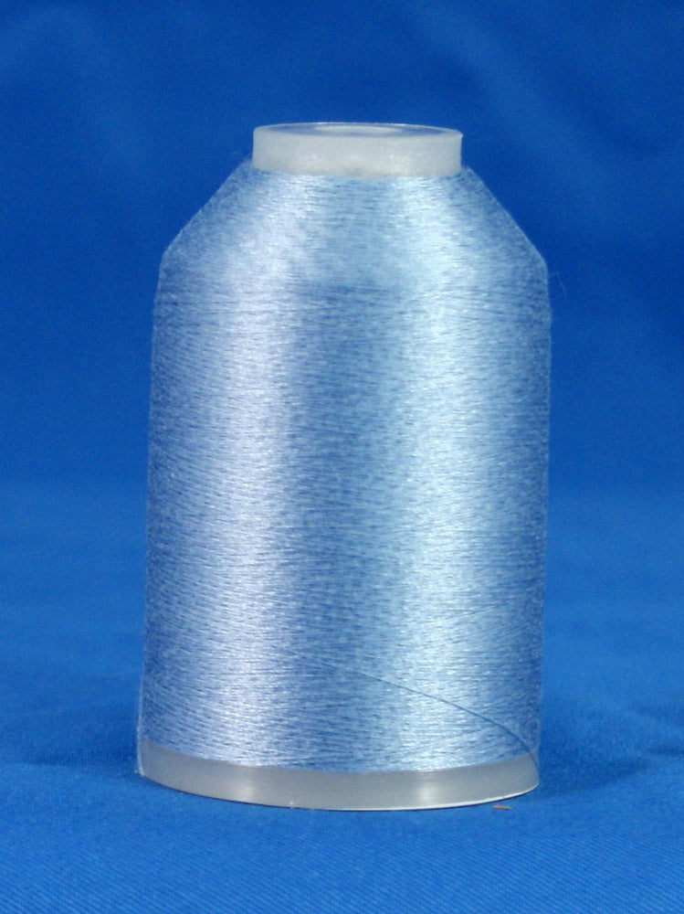 Light blue thread wound on white plastic cone against blue background