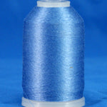 Blue embroidery thread wound on white plastic cone against bright blue background