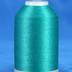 Kent green thread cone on white plastic spool against blue background, showing smooth wound thread surface