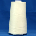 White thread wound on large conical spool against blue background