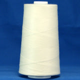 White thread wound on large conical spool against blue background