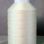 White thread cone spool with natural colored thread wound in horizontal layers