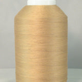 Large cone of light brown thread on white spool against gray background