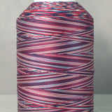 Red, white and blue variegated thread on white cone spool