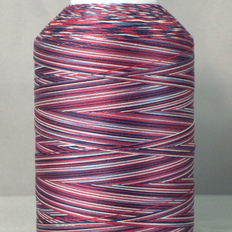 Red, white and blue variegated thread on white cone spool