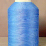 Light blue thread wound on white plastic cone spool
