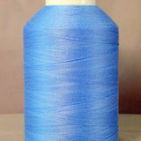Light blue thread wound on white plastic cone spool