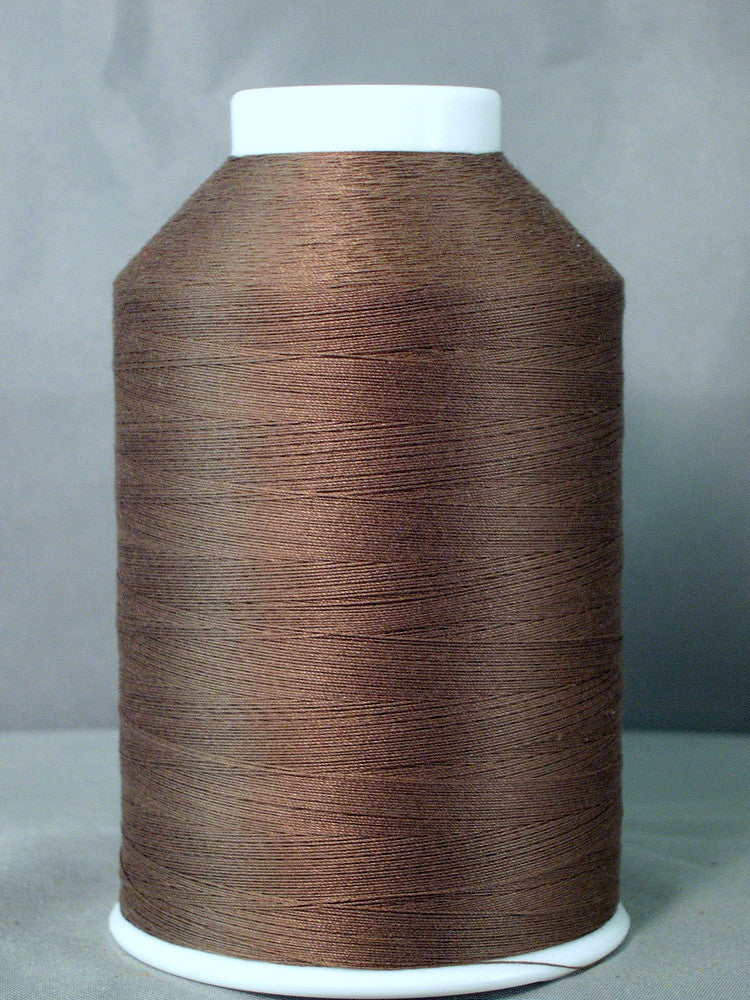 Dark taupe thread wound on white plastic cone spool