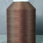 Dark taupe thread wound on white plastic cone spool