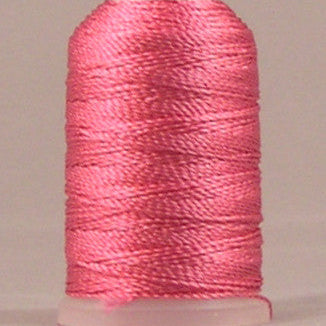 Shocking pink rayon thread wound on mini cone spool with pale pink top and bottom caps