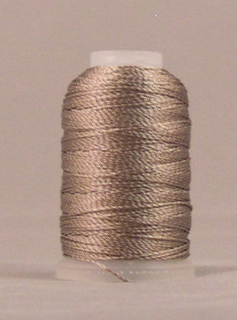 Taupe colored rayon thread wound on white mini cone spool against neutral background
