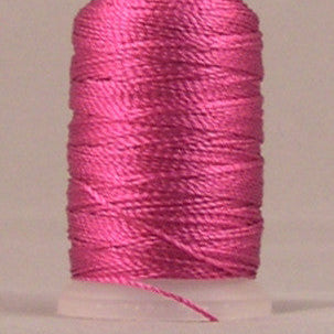Light fuchsia rayon thread wound on white plastic mini cone with loose thread end visible