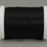 Black rayon thread wound on white plastic spool with smooth, lustrous finish