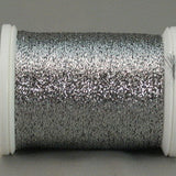 Antique silver metallic thread on white plastic spool with reflective, shimmery finish