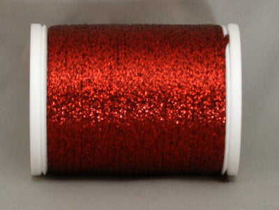 Dark red metallic thread on white plastic spool with shimmery, reflective finish