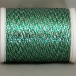 Silvery green metallic thread on white plastic spool with shimmery finish