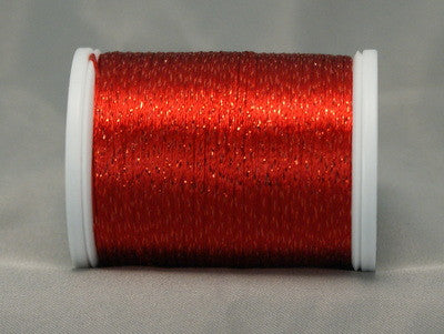 Red metallic rayon thread on white plastic spool, showing shimmery reflective finish