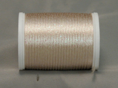 Ecru and opal rayon metallic thread on white plastic spool, shimmery cream with subtle iridescent finish.