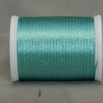 Aqua metallic thread on white plastic spool with shimmery finish