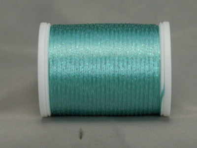 Aqua metallic thread on white plastic spool with shimmery finish