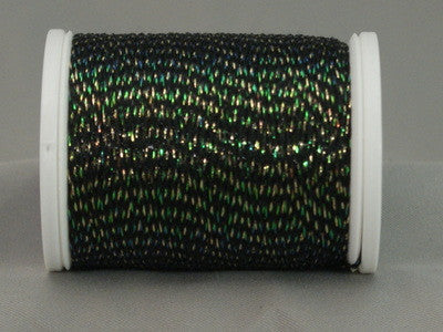 Black thread with iridescent green highlights on white spool, metallic shimmer visible throughout