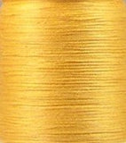 Solid Curry cotton quilting thread, 30 wt. 3-ply