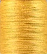 Solid Curry cotton quilting thread, 30 wt. 3-ply