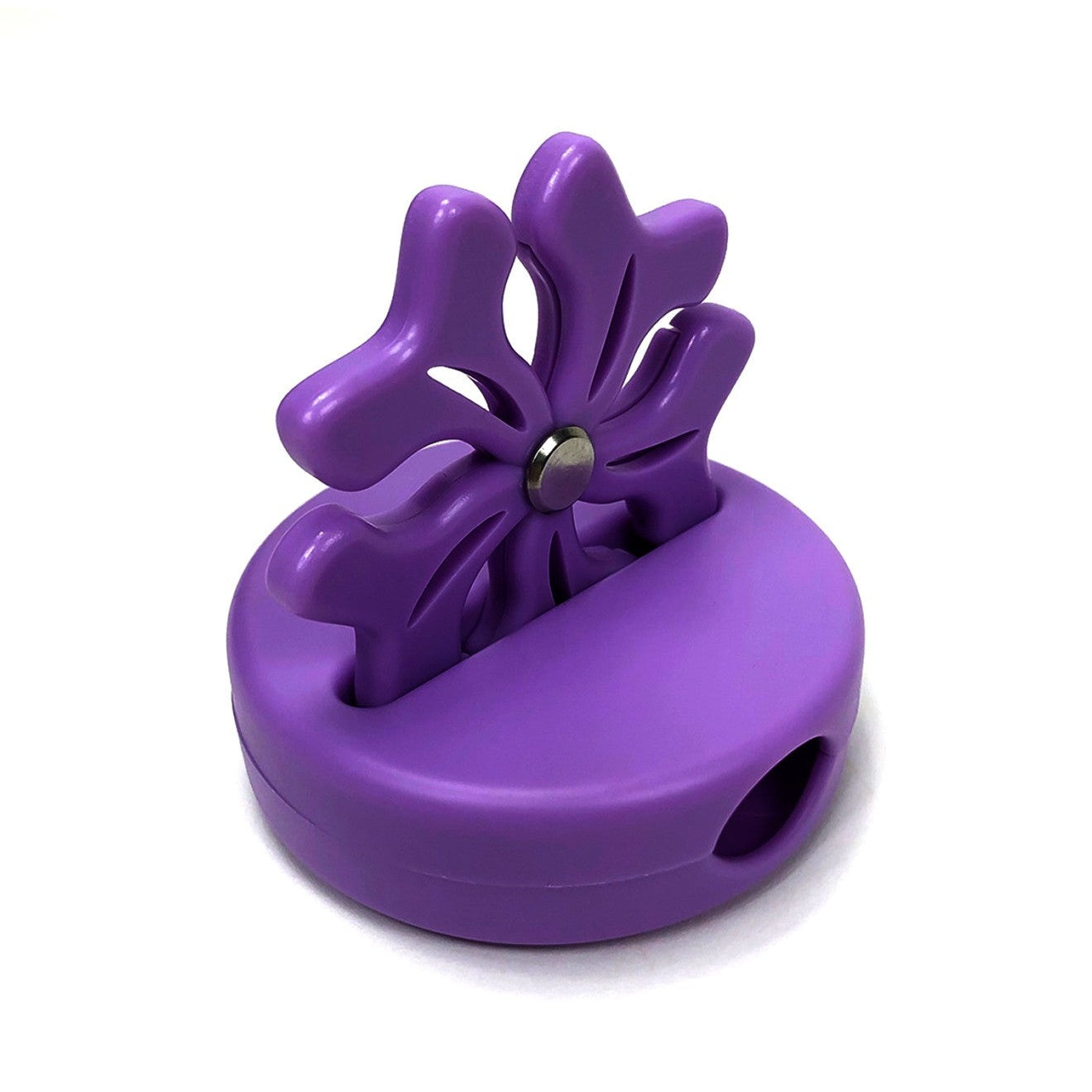 Purple flower-shaped thread cutter with curved petals and circular base featuring a small metal cutting blade in the center.