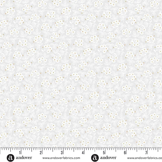 Soft tones with a print of tiny daisies on a light gray backgroun