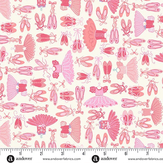 Pink ballet shoes and tutus and leotards on a soft white backgrou