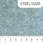 Green and gray seed shapes. The creation of batiks is an ancient art that has been passed down though generations of artisans. Banyan Batiks, a division of Northcott Fabrics, are handmade by the local artisans of Indonesia who take pride in their culture and leading expertise in batiks.