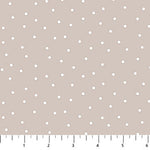 Taupe background with scattered white dots.