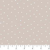 Taupe background with scattered white dots.