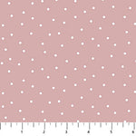 Pink background with scattered white dots.