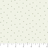 Light sage green background with scattered green dots.