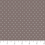 Brown background with cream colored stars in neat rows.
