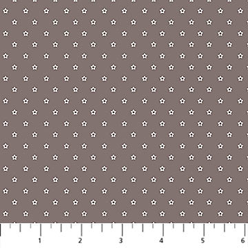 Brown background with cream colored stars in neat rows.