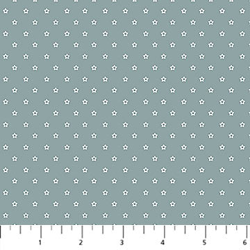 Green background with cream colored stars in neat rows.