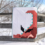Dream big, little one!
Stitch up this original baby quilt and le