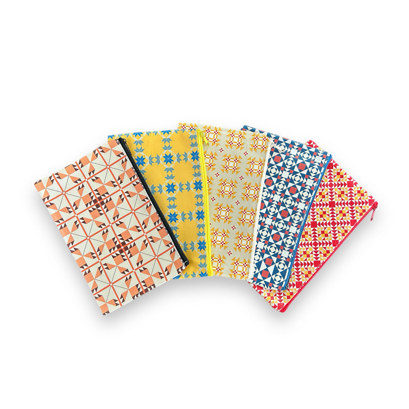 Zippered pouches all featuring a different color & quilt pattern.