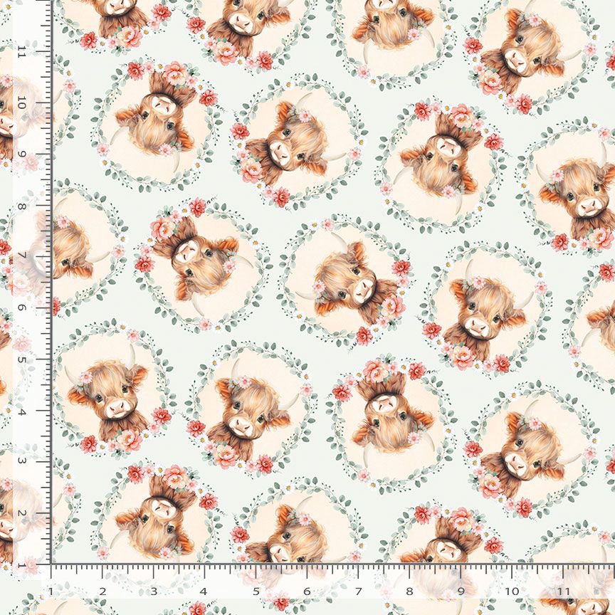 Light blue background with cow faces surrounded by flowers.