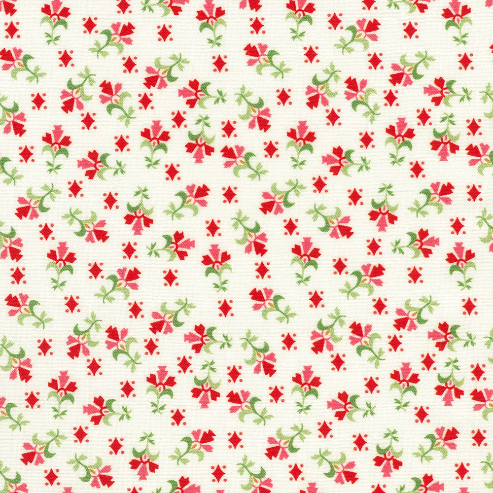 Cream background with red diamonds and tiny pink and red flowers.