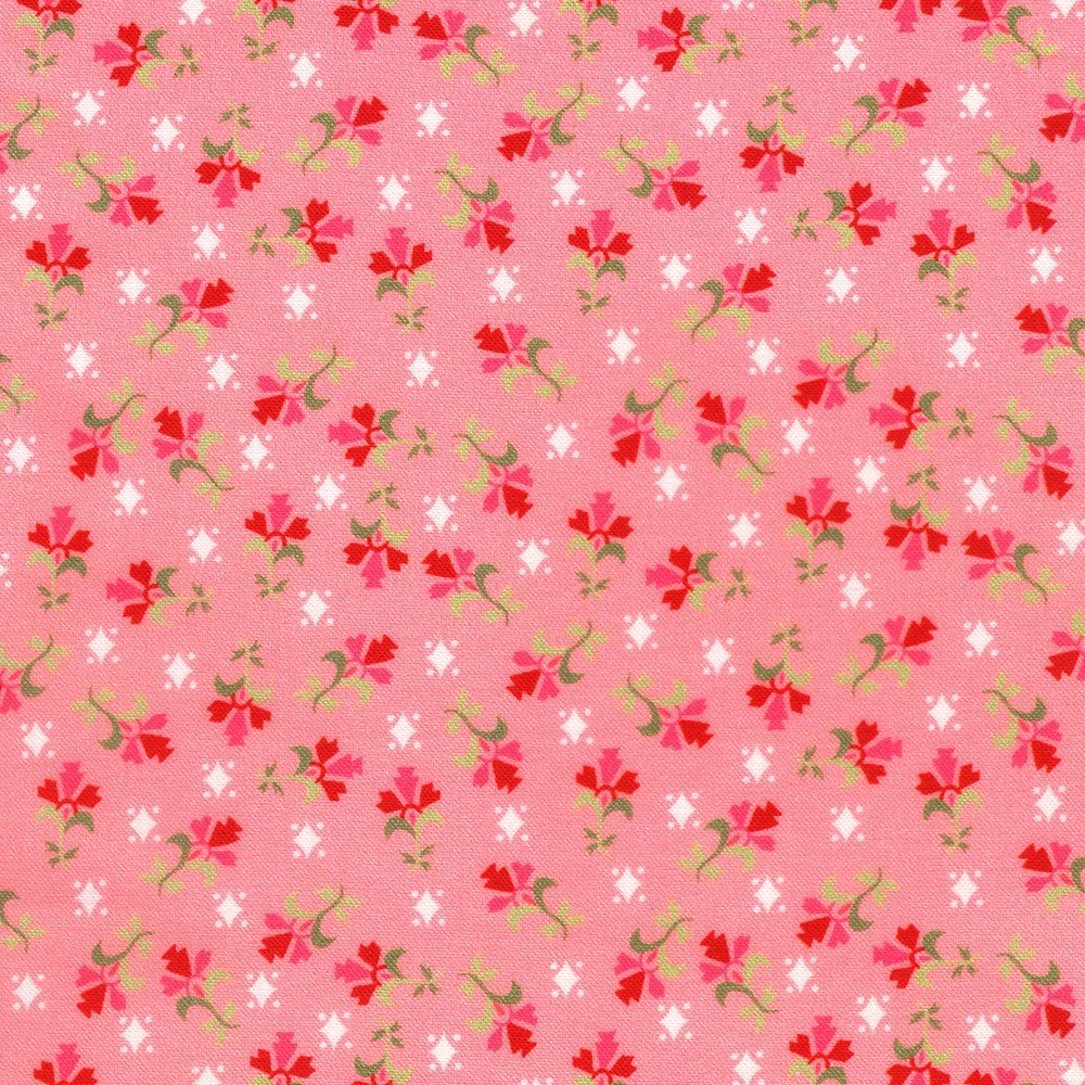 Pink background with small white diamonds and flowers. 
Small pr