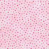 Pink dots on a light pink background.
Small prints, big impact! 