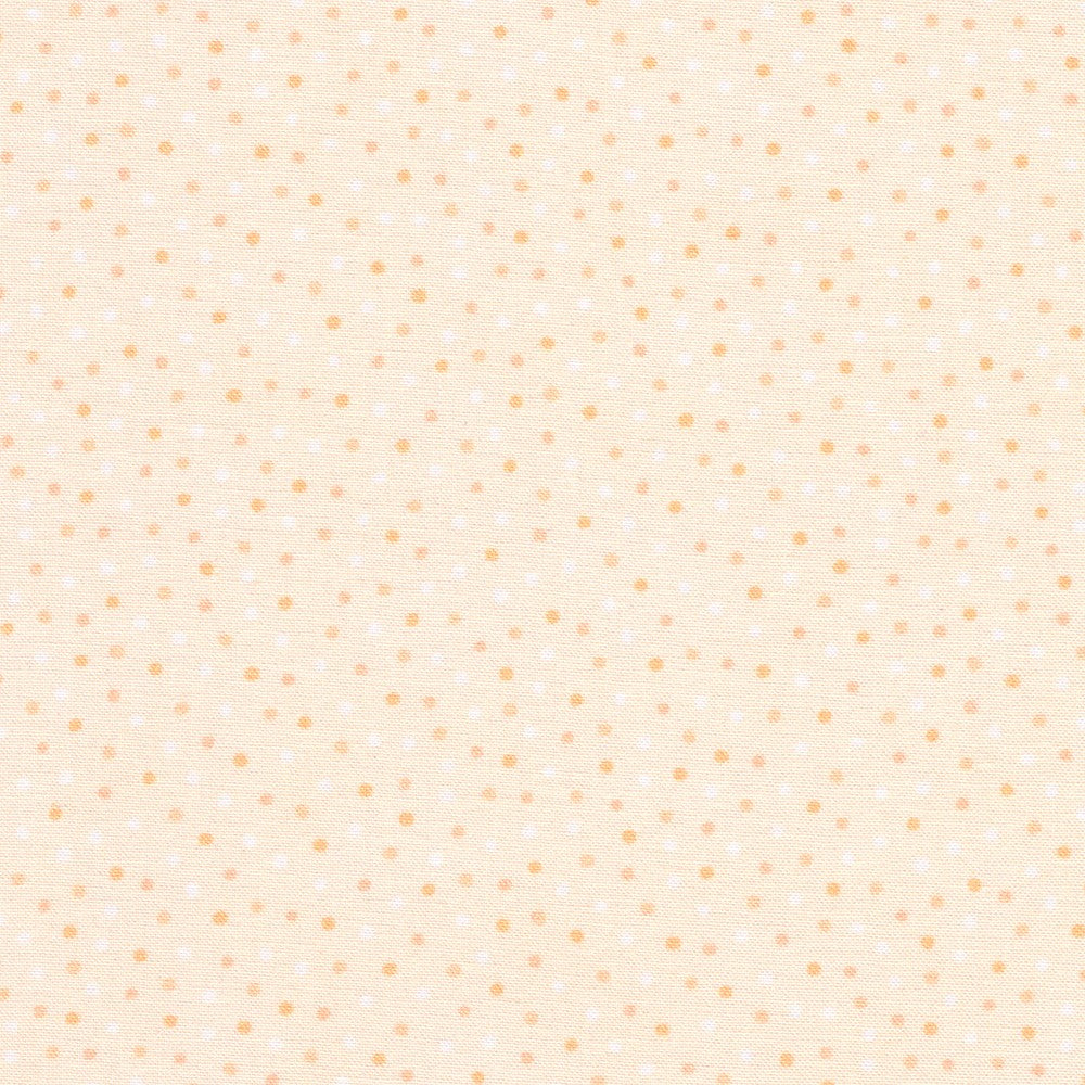 Orange and white dots on a cream background.
Small prints, big i