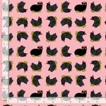 Black and white spotted chickens, sitting peacefully on their nes