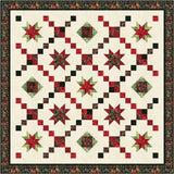Red and green batik star quilt with diamond blocks on cream background, featuring floral border in traditional Christmas colors
