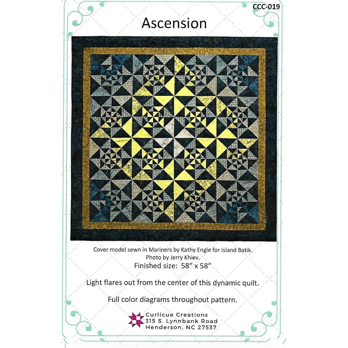 A geometric quilt pattern featuring a radiating star design in yellow, navy, and gray fabrics with triangular piecing and dark borders.