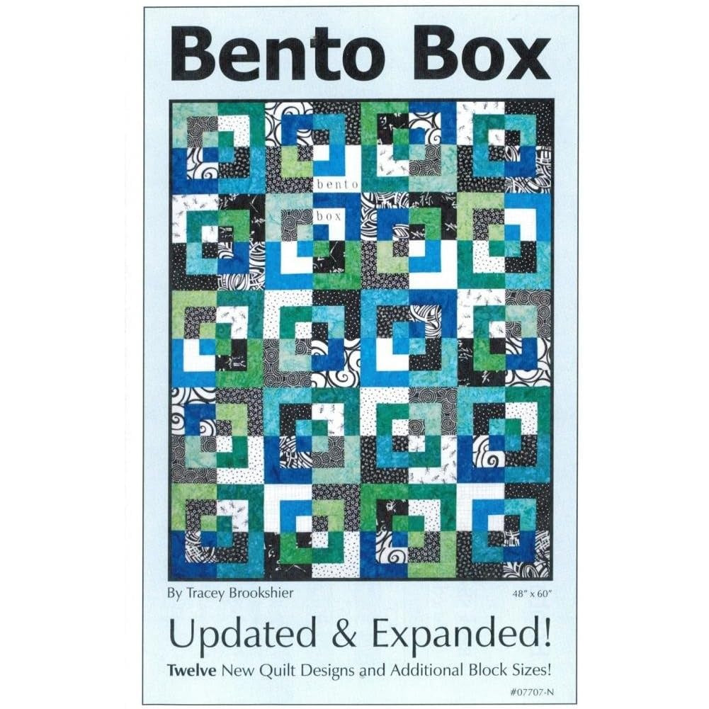 A quilt pattern cover showing a geometric design with interlocking squares in blues, greens, black and white fabrics arranged in a modern bento box style.