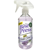 Clear spray bottle with white trigger containing purple-tinted liquid, labeled "Best Press" starch alternative with lavender scent.